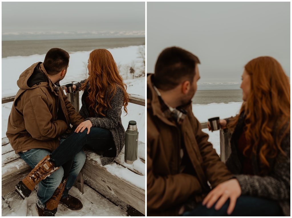 Ciara and Bryce enjoy last few moments of their engagement shoot watching the sunset over Lake Michigan in Holland, Michigan