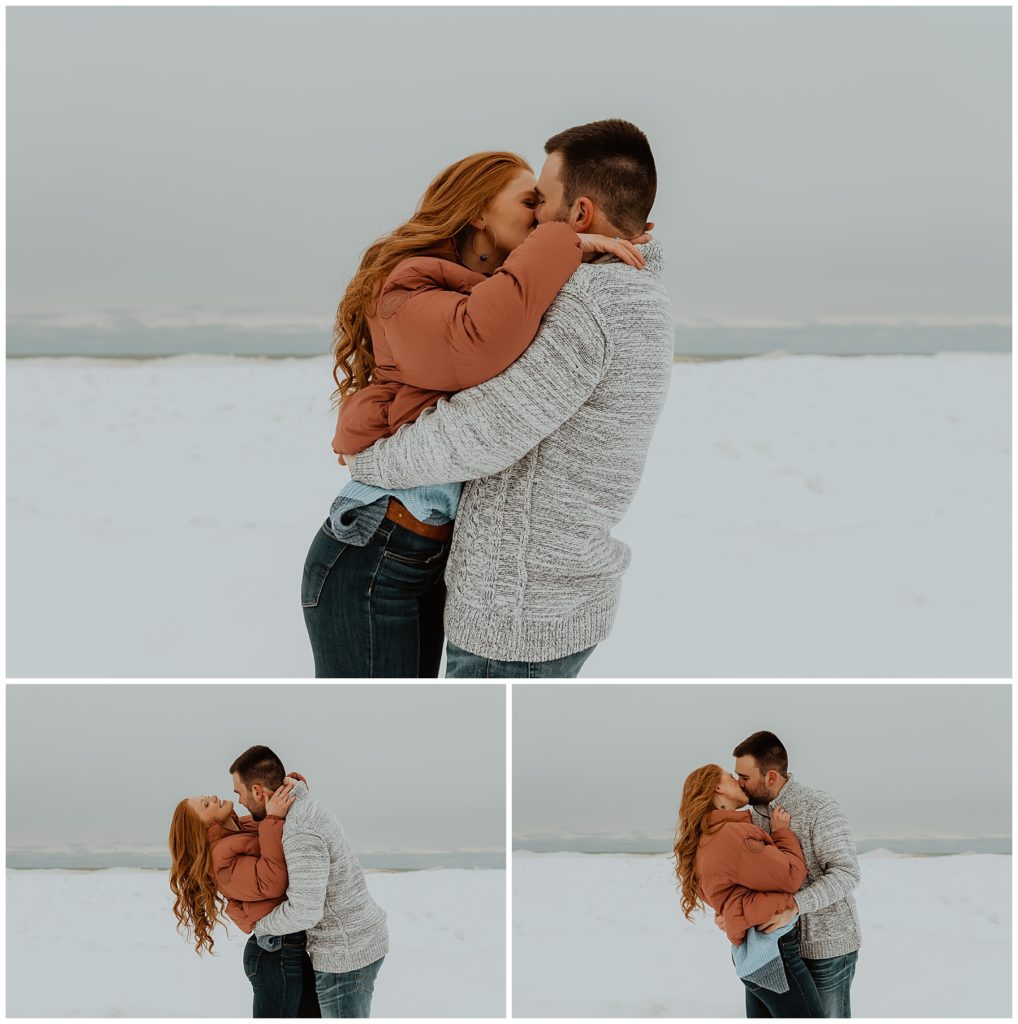couple kissing overlooking lake Michigan 